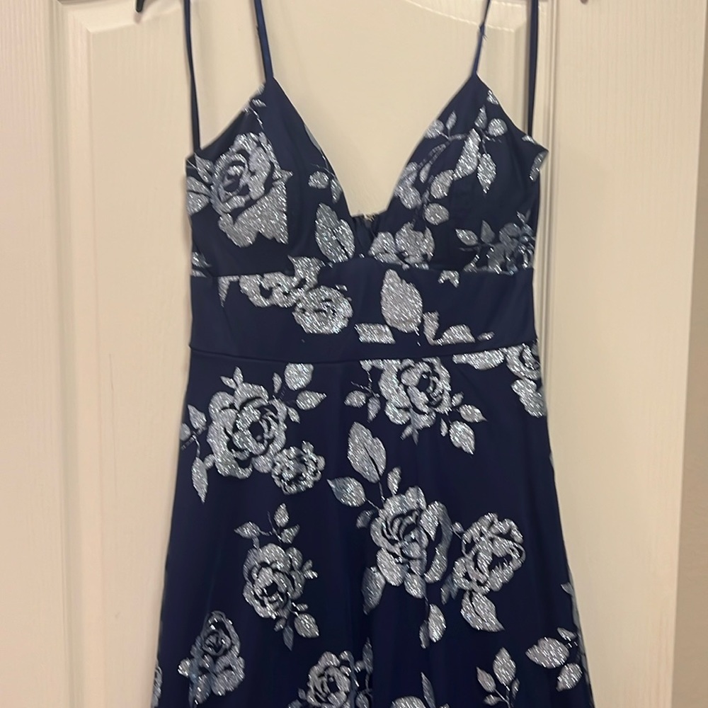 Evening gown in navy with silver rose pattern